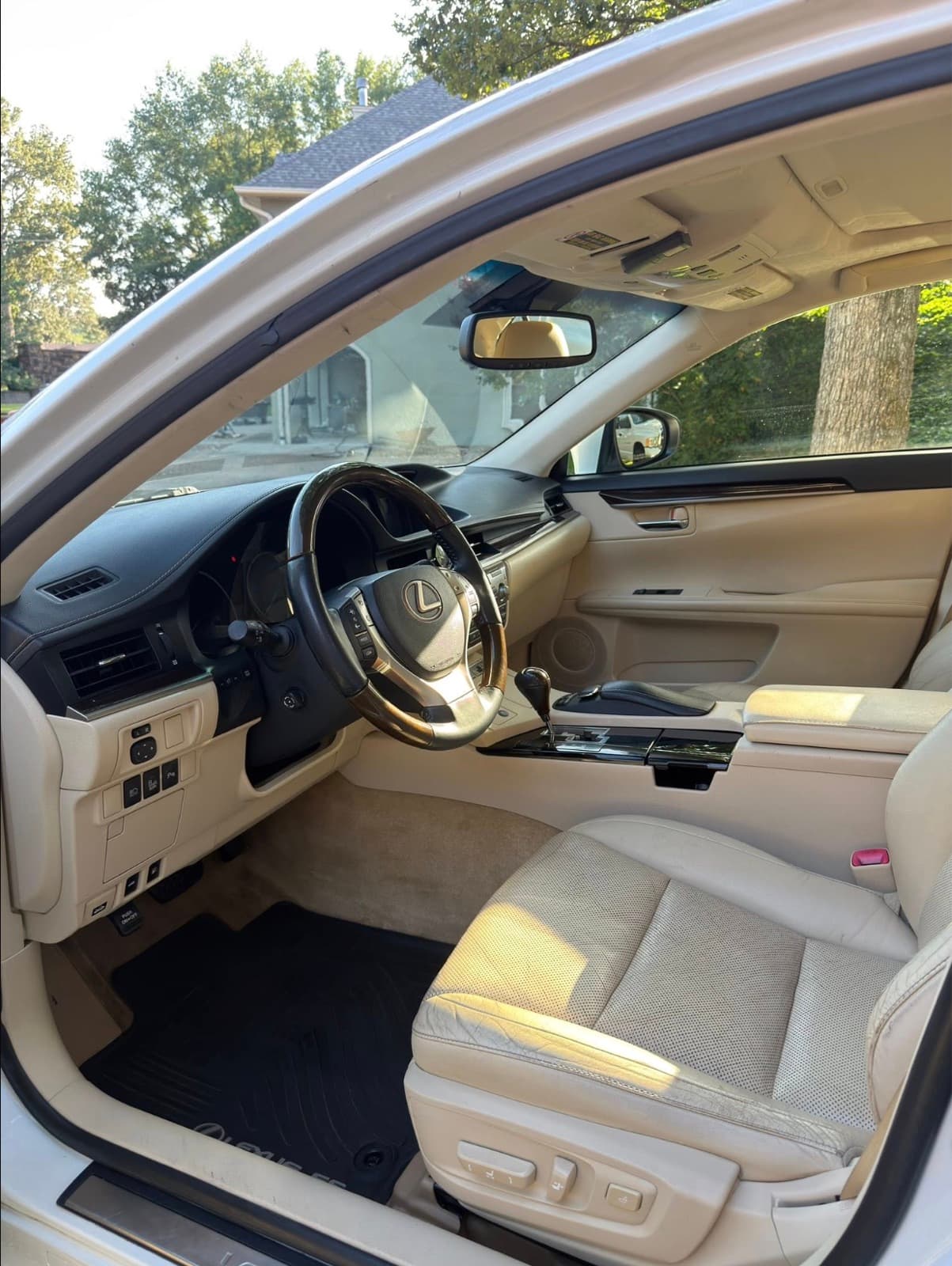 Clean tan leather interior of a freshly detailed sedan